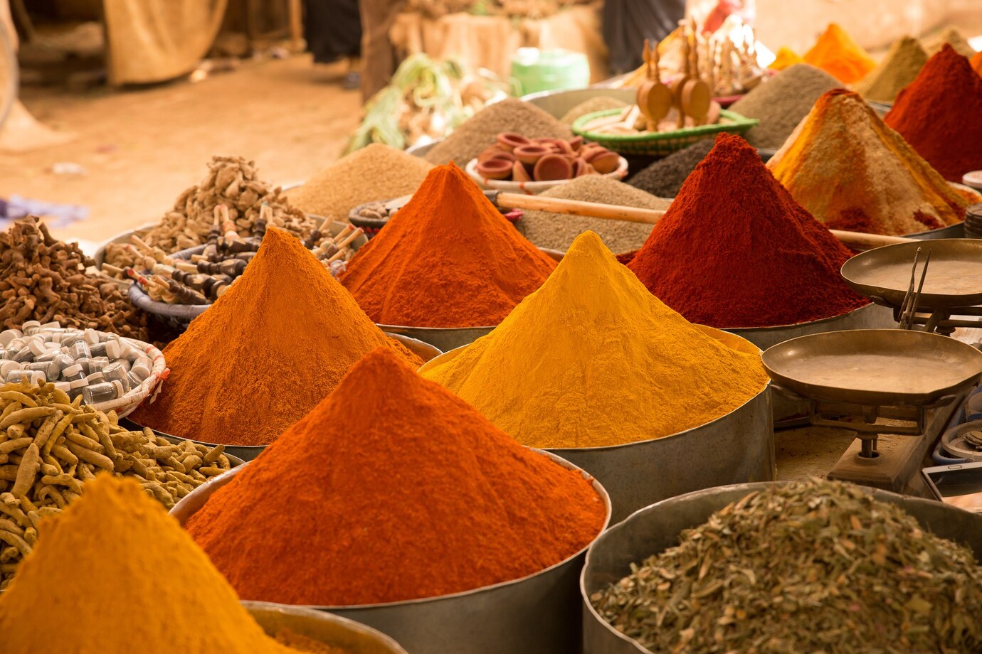 closeup-shot-colorful-asian-spices-market-with-blurry_181624-16223.jpg?1709556315499